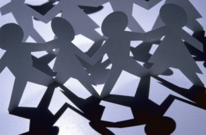 rows-of-paper-cut-out-dolls